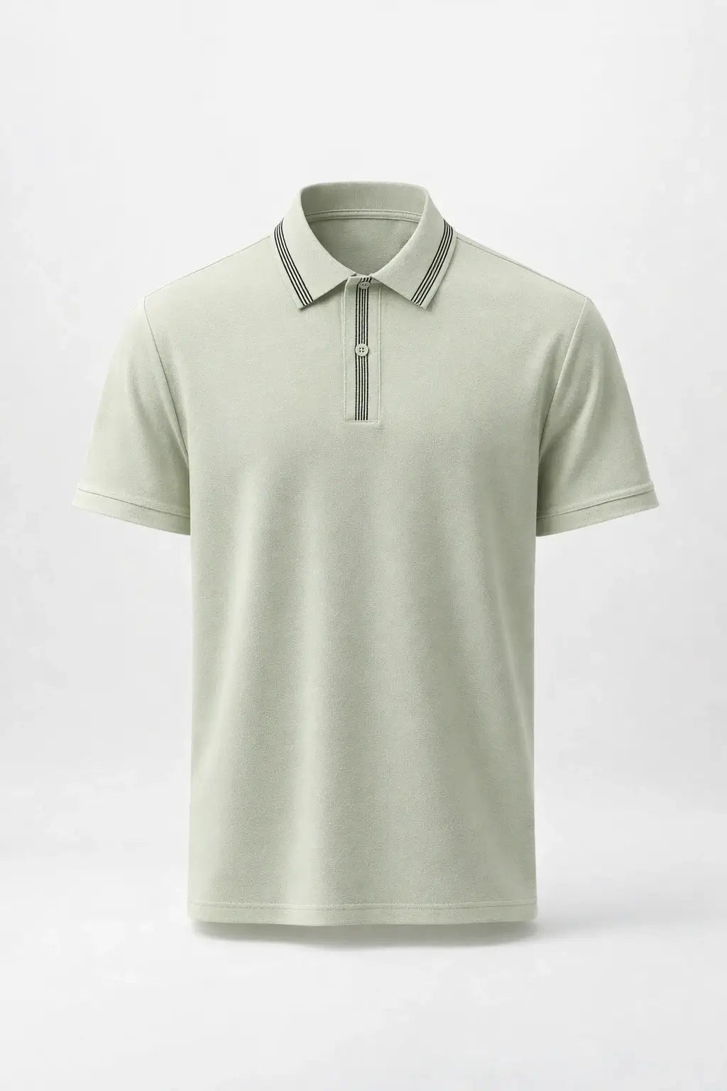 Light green polo shirt with striped collar on a white background